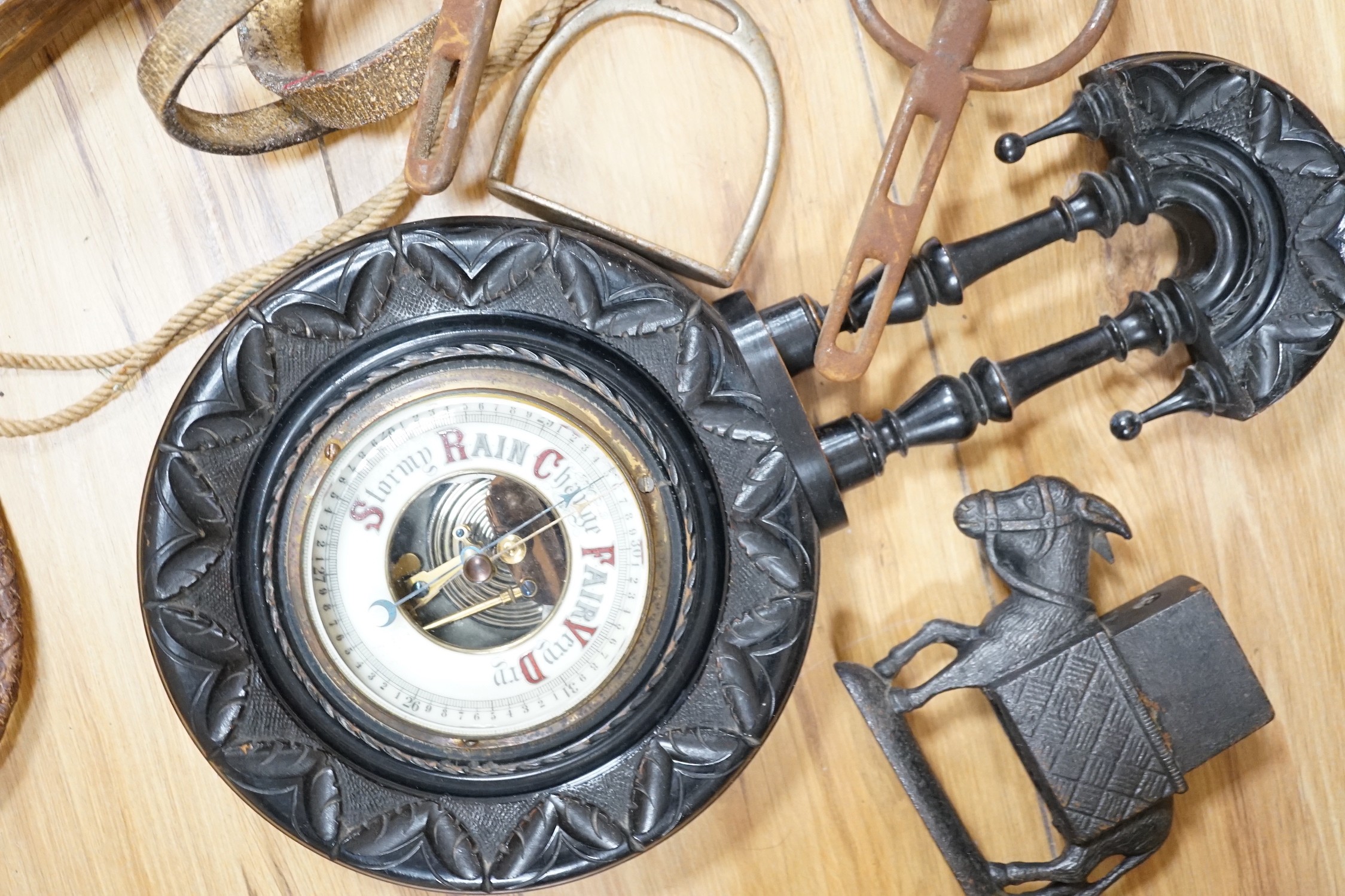 Assorted horse accessories, iron castings, a Disraeli plaque, etc